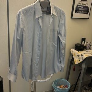 Great condition with 1 missing button on cuff.